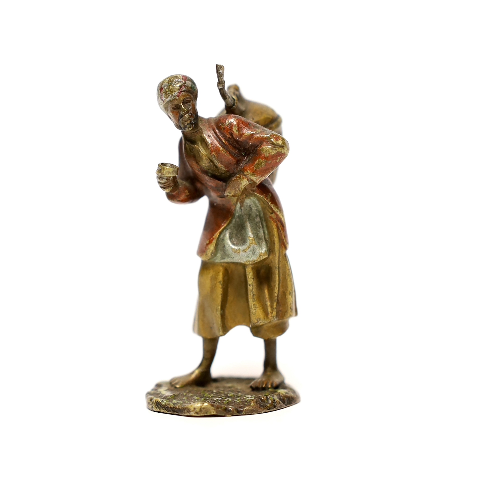 A cold painted bronze figure of an Arab coffee seller, 5.5 cm high